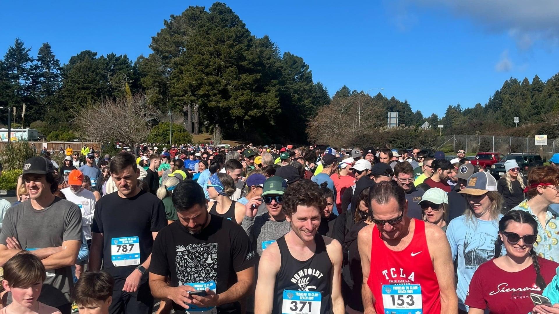 Volunteers coordinating runners at a California community 5K event